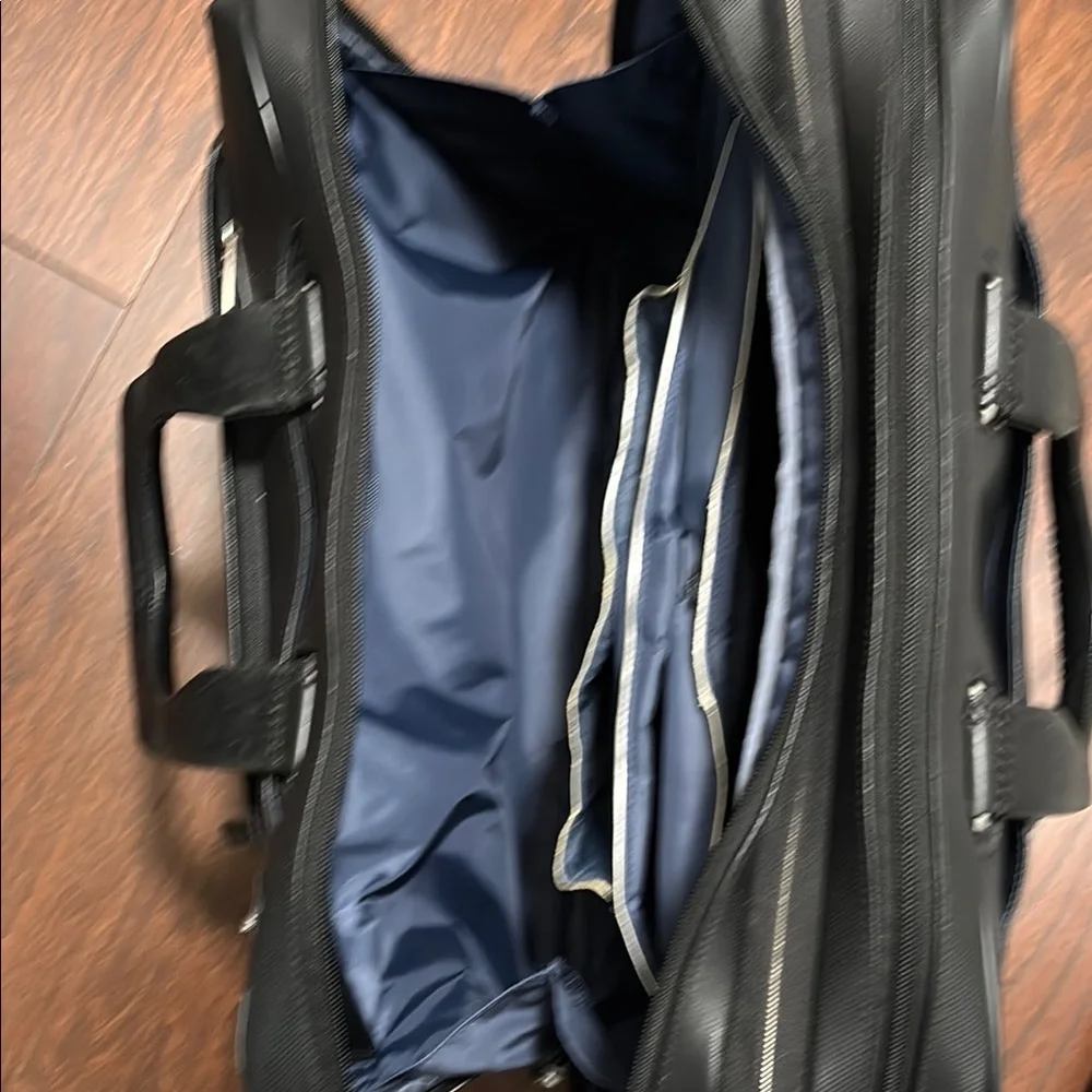 Tumi Black Professional Briefcase with Durable Design